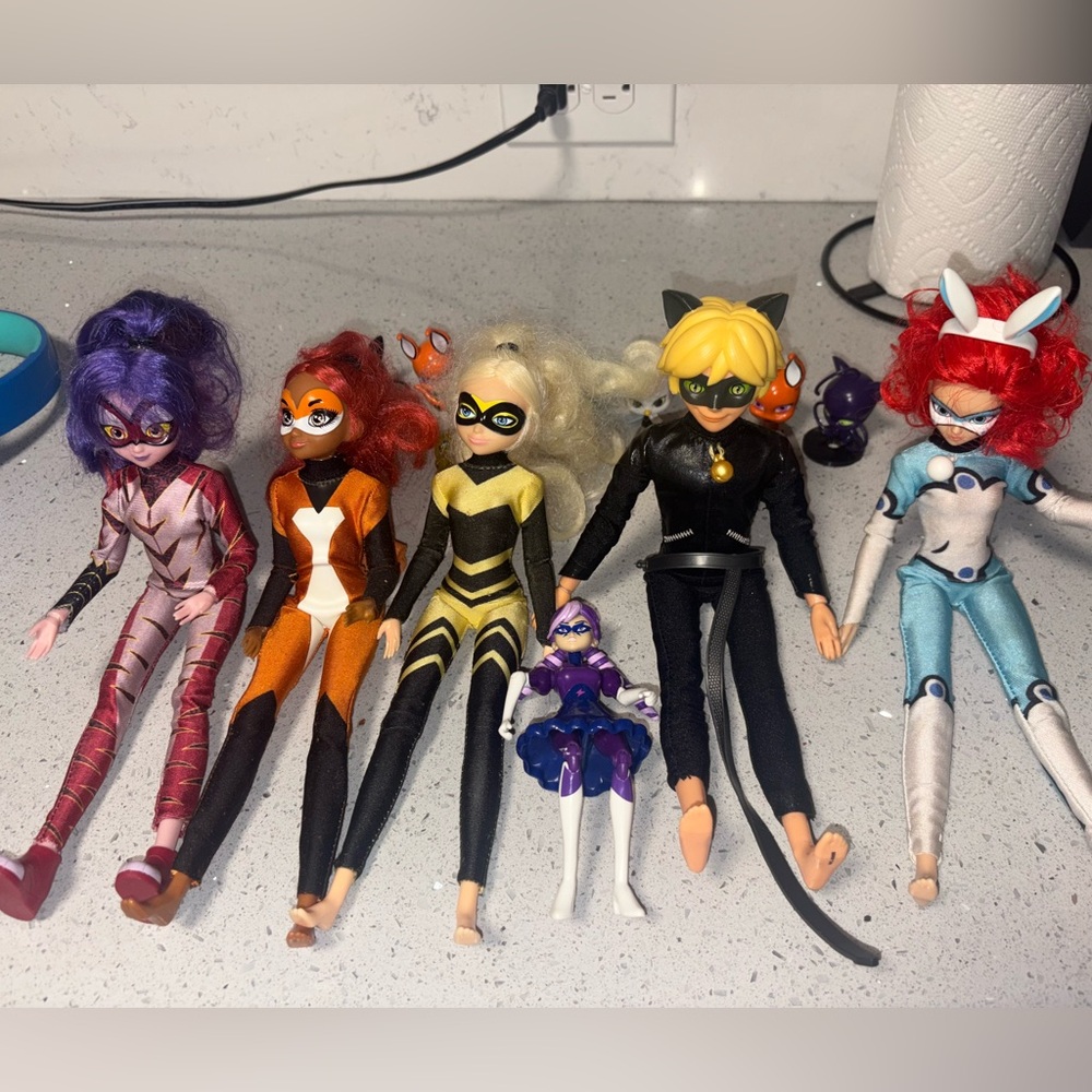 Miraculous ladybug characters and Kwame's.